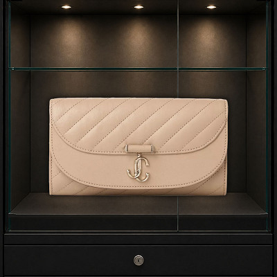 Jimmy Choo- curve leather wallet on chain or £250