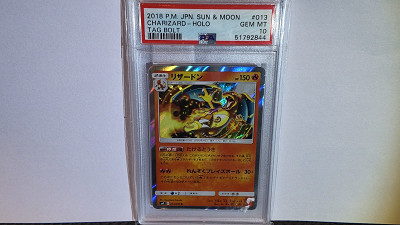 PSA 10 Charizard #013/095 • Tag Bolt or £70