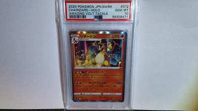 PSA 10 Charizard #012/100 • Amazing Volt Tackle or £50