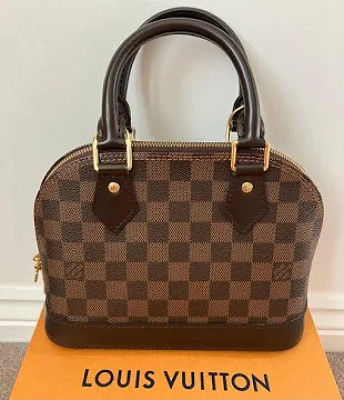 LV ALMA BB EBENE CANVAS or £500