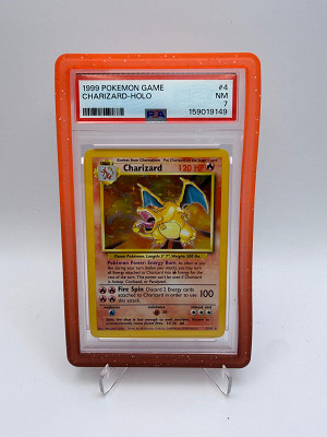 PSA 7 Charizard #4/102 • Base Set Unlimited or £600